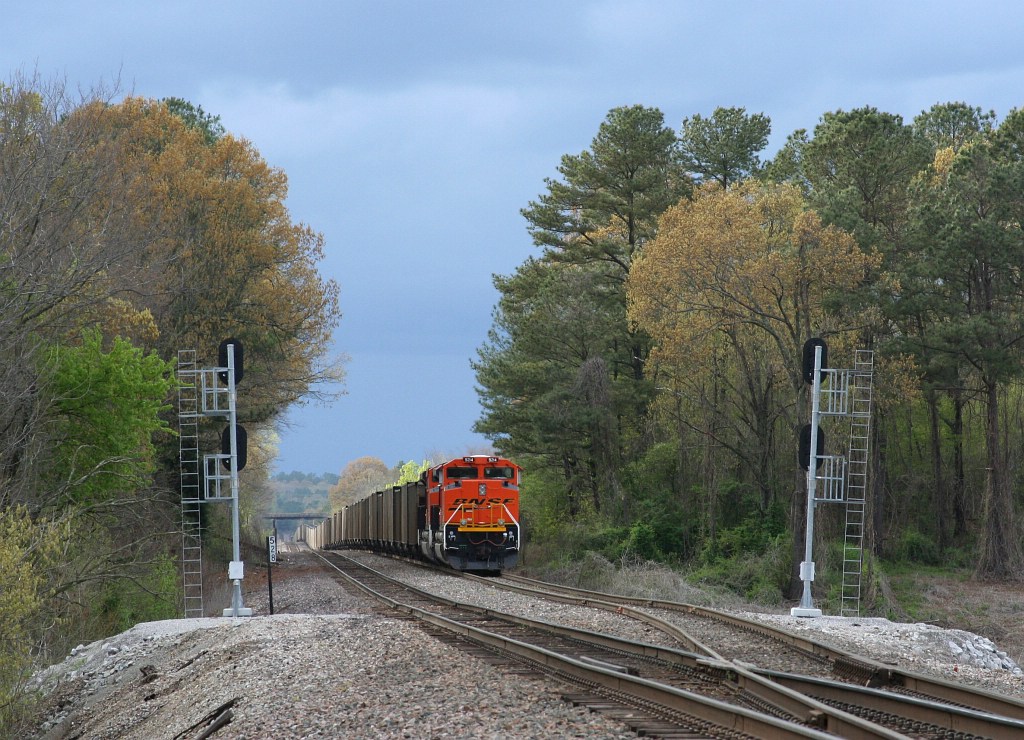 EB loaded coal train under threatening skies